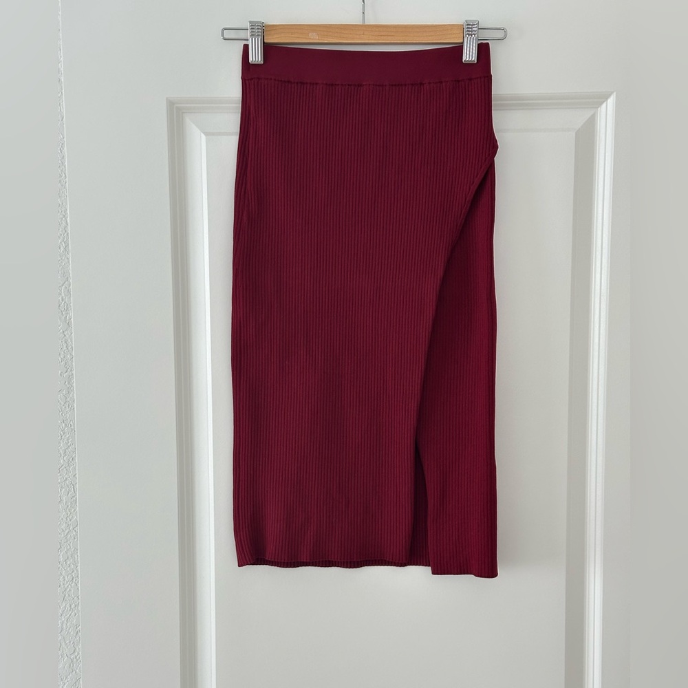 JONATHAN SIMKHAI
Deep Rib Wrap Skirt
Never worn